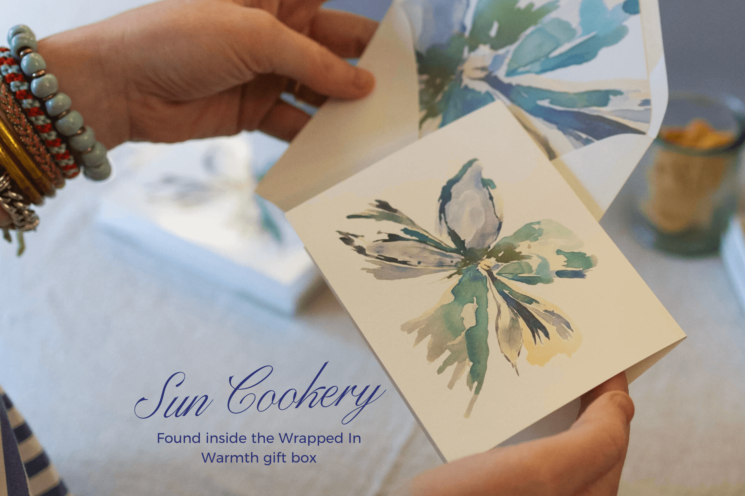 An artist designed notecard in Sun Cookery's Wrapped In Warmth gift box