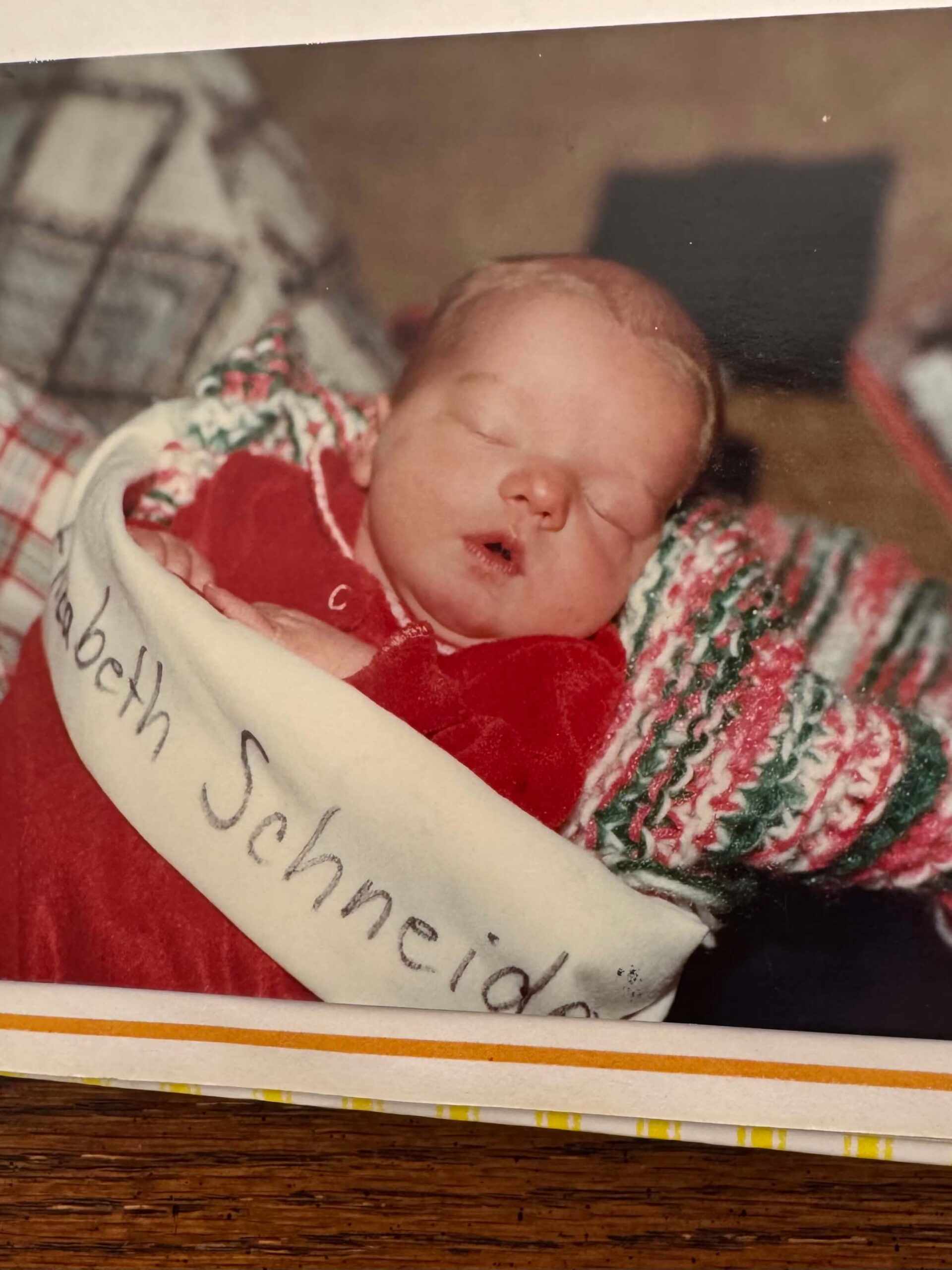 Christmas birthday baby arriving in a stocking from the hospital.